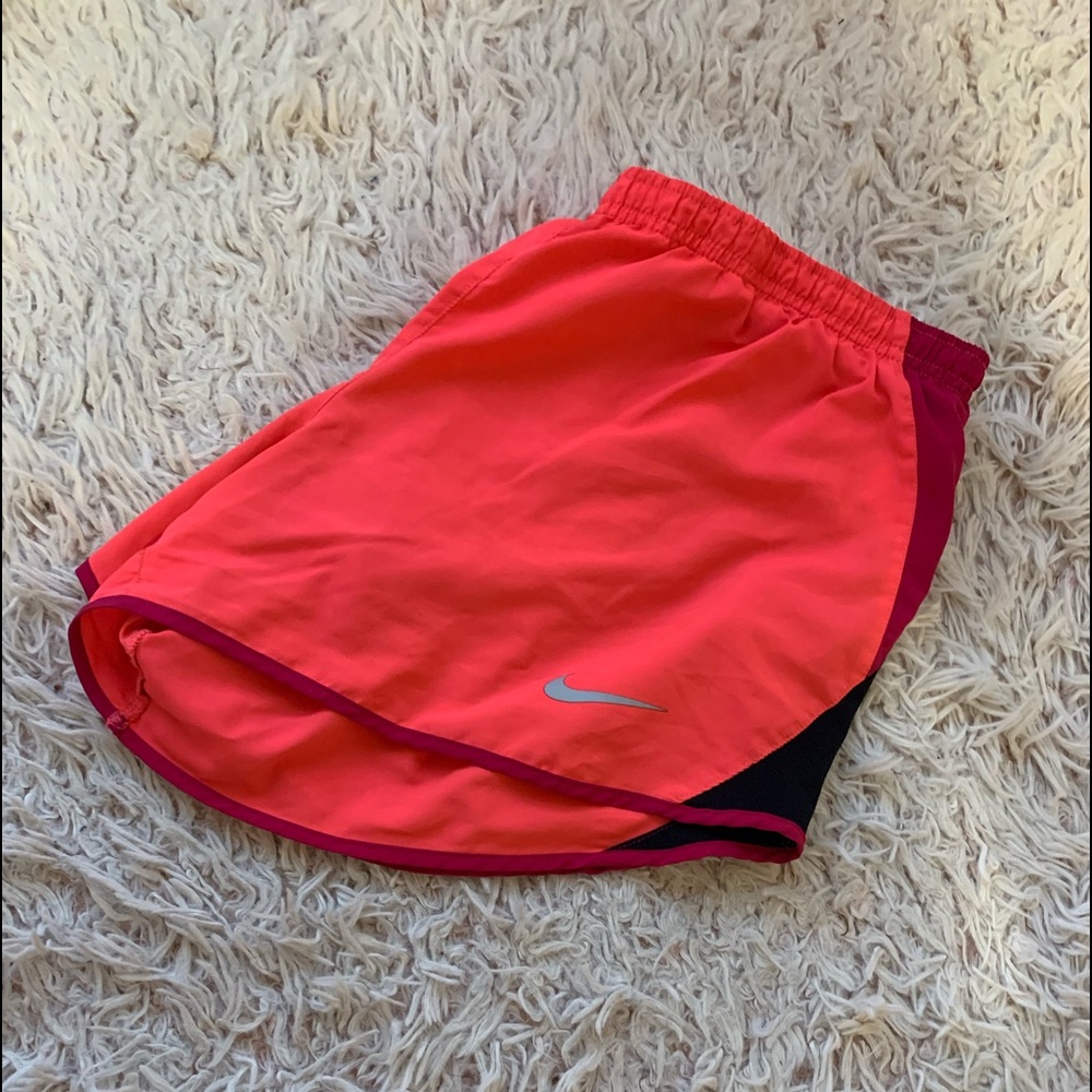 Pink Nike shorts in a size medium.